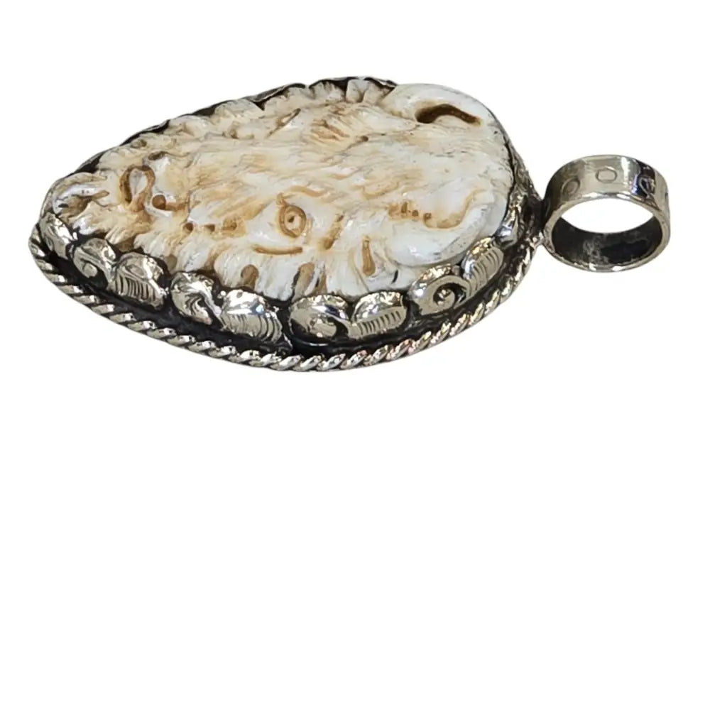 Hand-Carved Natural Bone Buffalo Head Pendant Featuring a Tibetan Silver Design