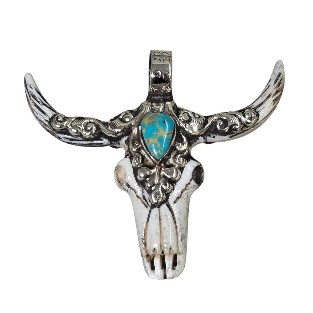 Hand-Carved Natural Bone Longhorn Bull Pendant Adorned with a Tibetan Silver Design inlaid with a Turquoise Stone.