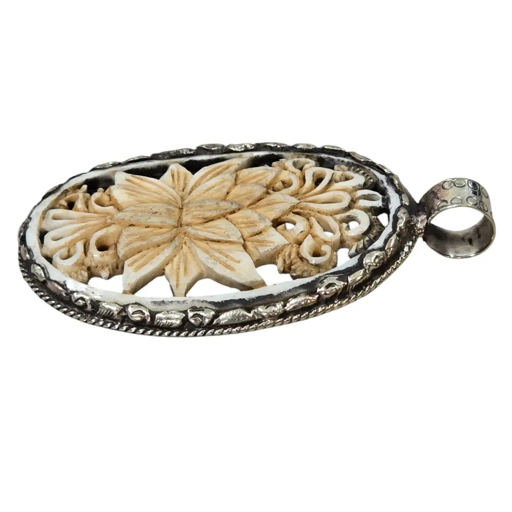 Hand-Carved Natural Bone Lotus Flower Pendant Featuring a Tibetan Silver Design