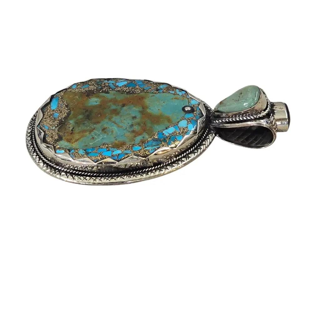 Handmade African Handcrafted Turquoise Pendant Featuring a Tibetan Silver Design